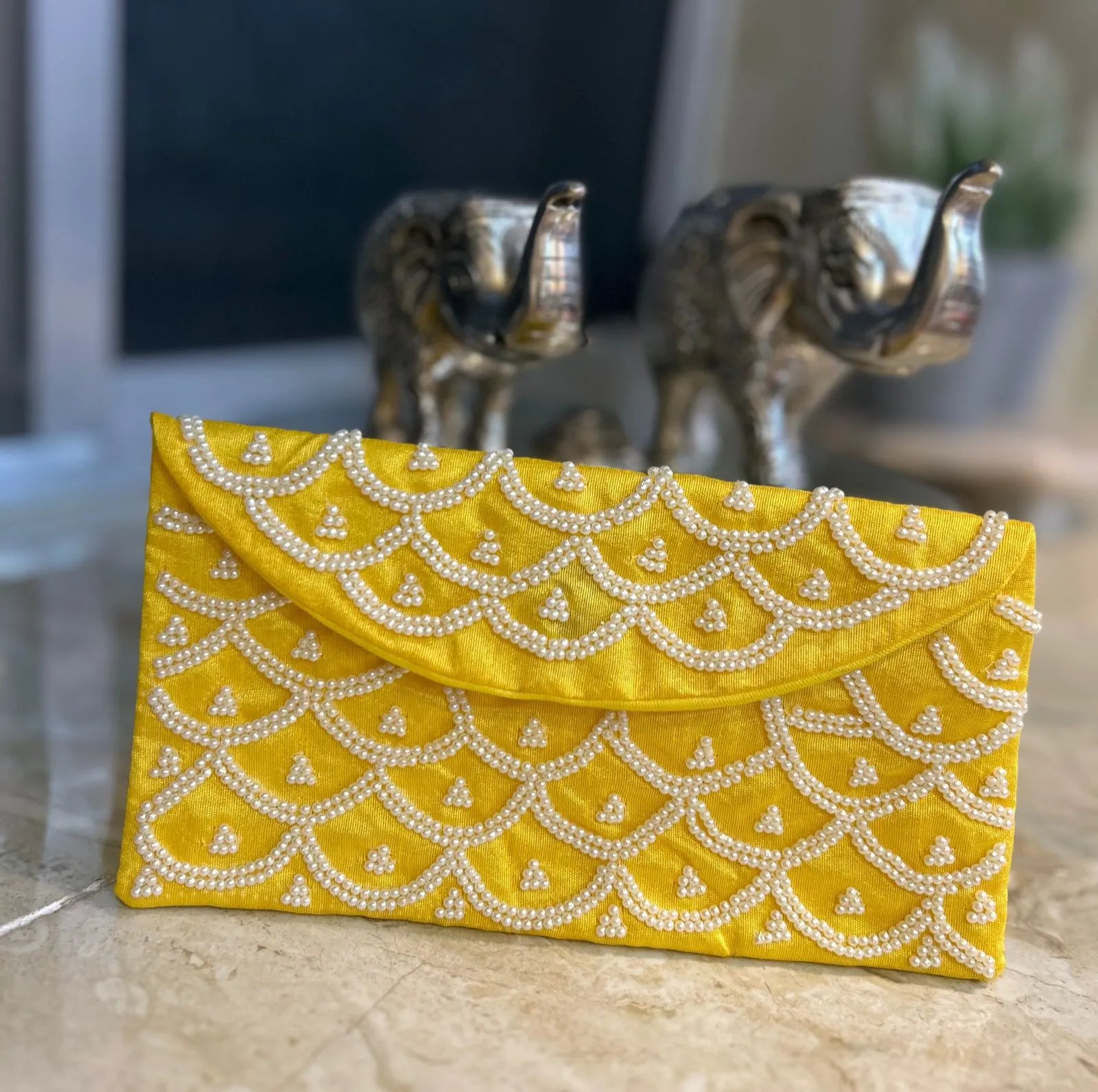 Intricate Pearl Envelopes