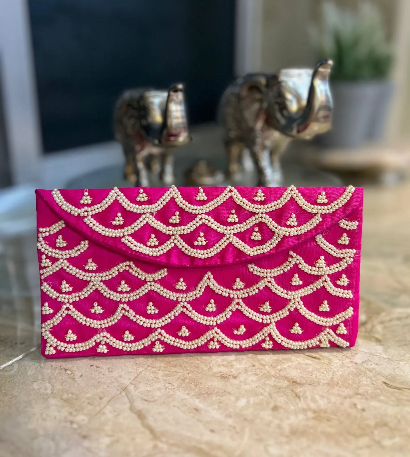 Intricate Pearl Envelopes