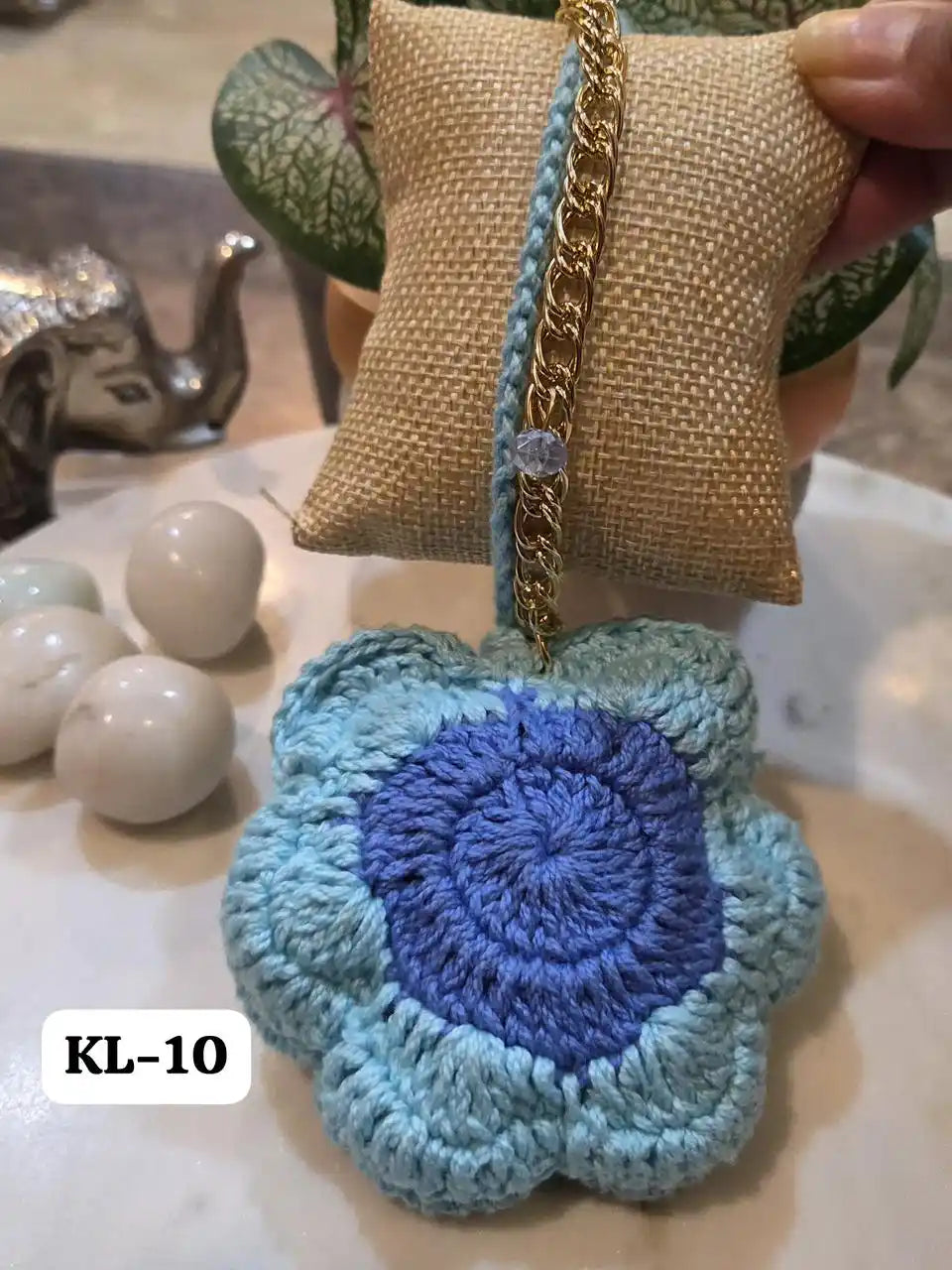Eye-catching Crocia Flower Bracelet Bag Charm in shades of blue