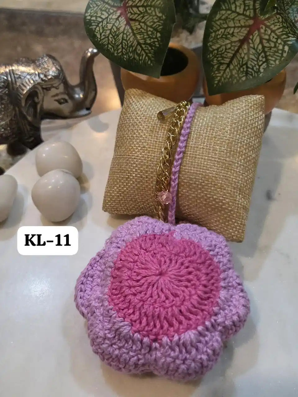 Eye-catching Crocia Flower Bracelet Bag Charm in shades of blue