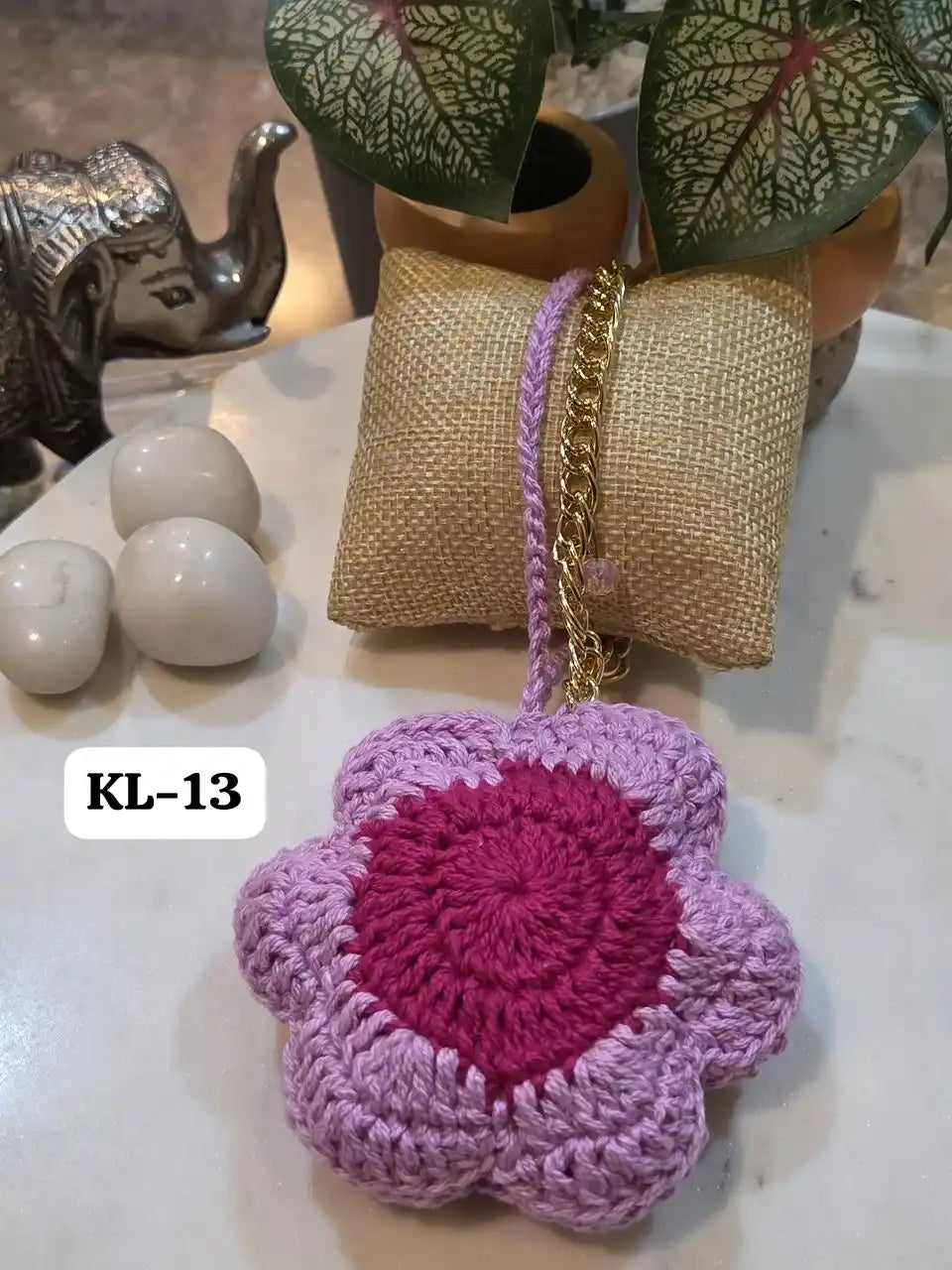 Eye-catching Crocia Flower Bracelet Bag Charm in shades of blue