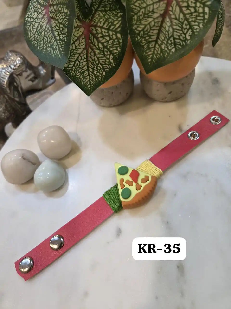 Delightful Pizza Leather Band Rakhi