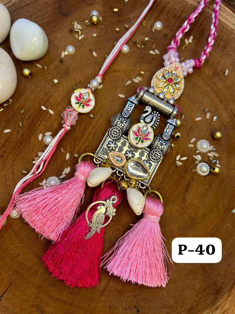 Vintage & Elegant Kundan & Peacock Antique Rakhi Pair in Pretty Pink