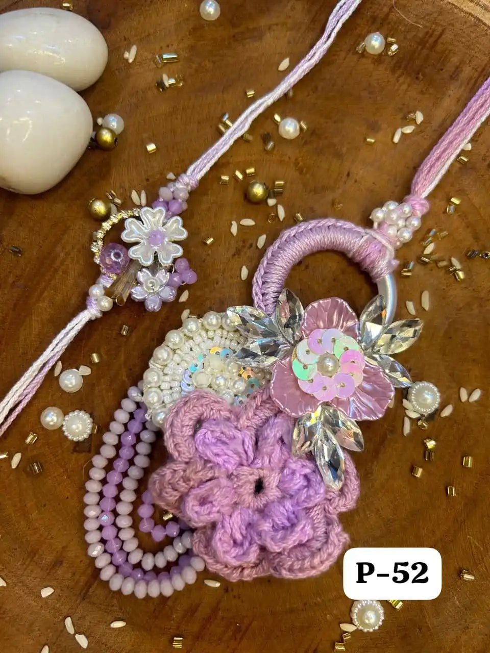 Pearl Radiance Crochet Rakhi Pair in Lavender