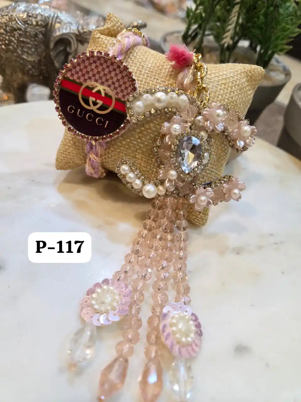 Elegant Beaded Chanel Bracelet with Gucci Rakhi
