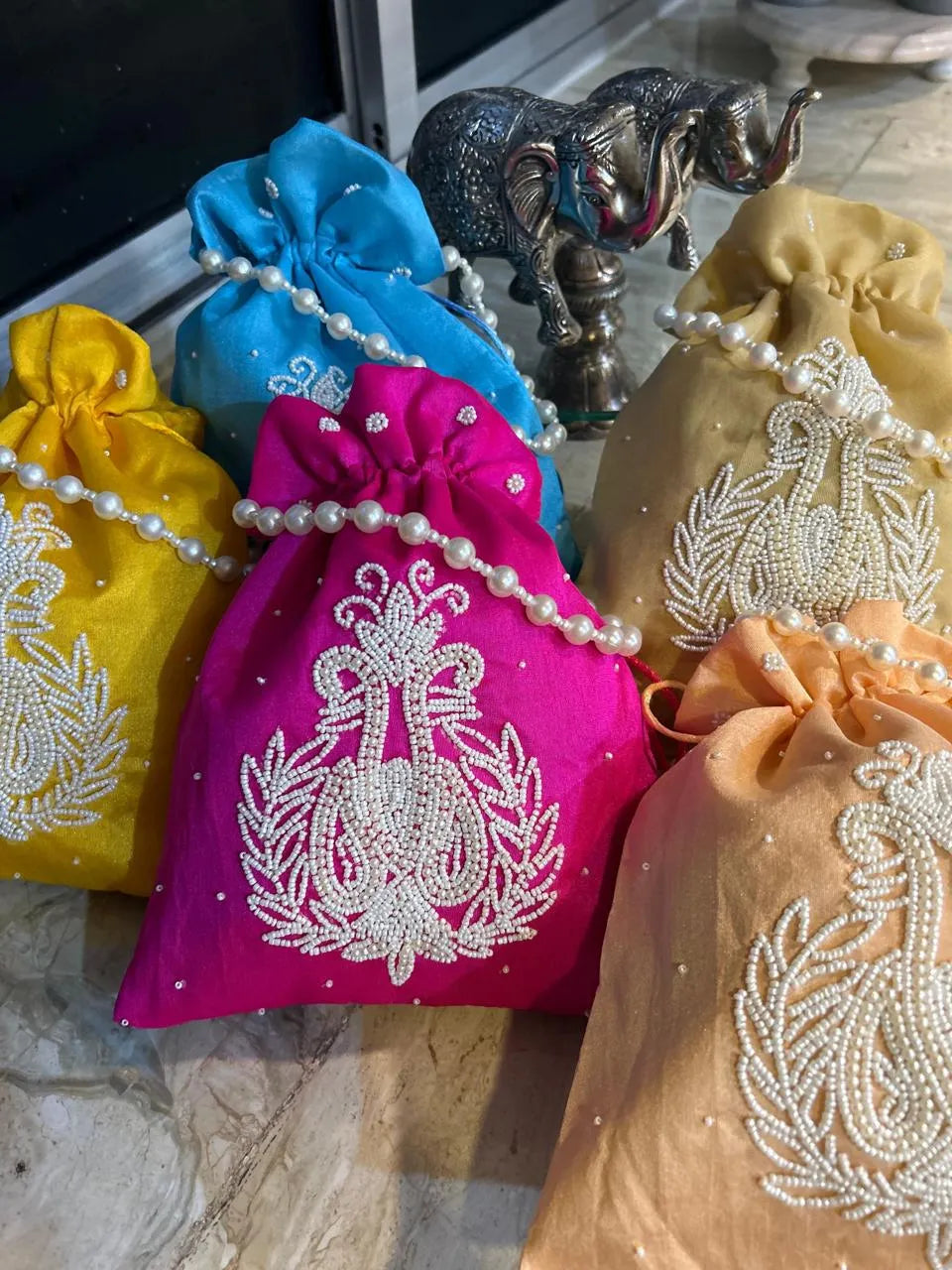 Signature Pearl potli