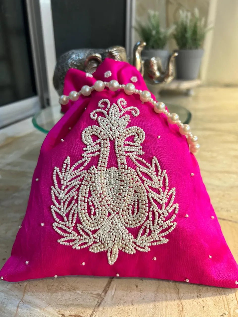 Signature Pearl potli