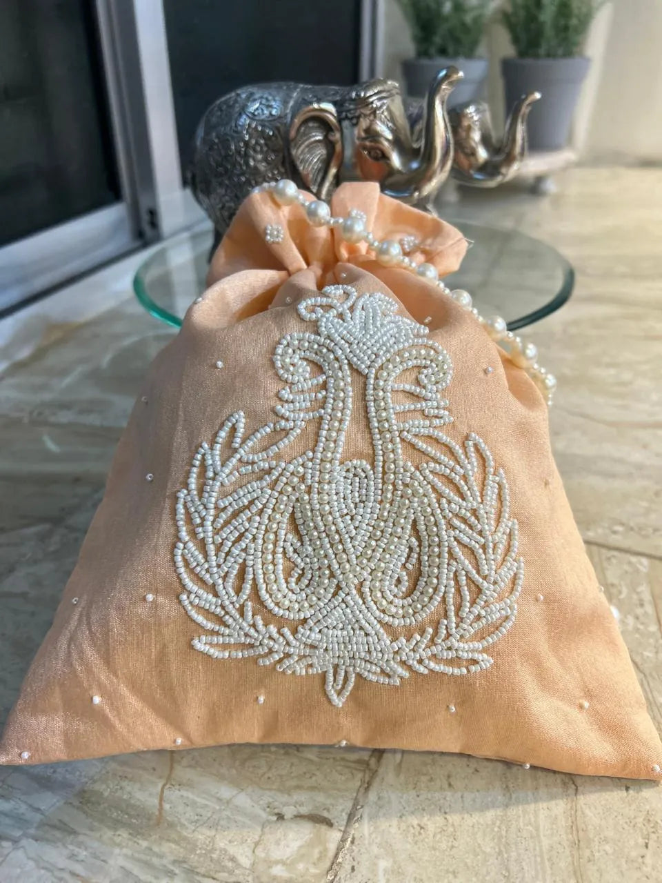 Signature Pearl potli