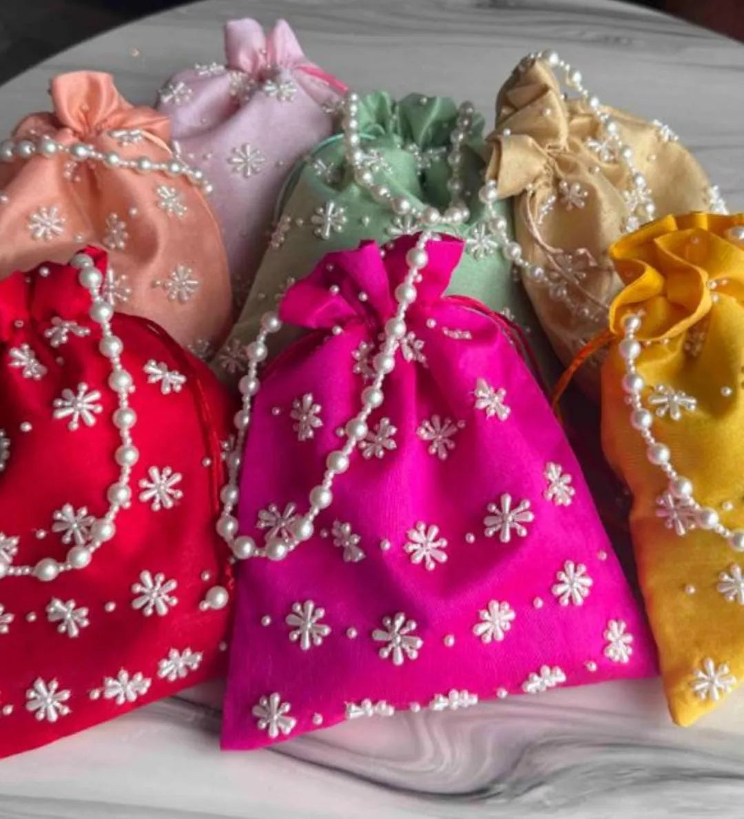 Delicate pearl potli