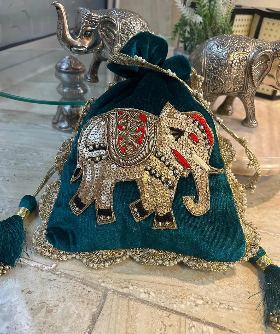 Royal & traditional Zardosi elephant potli
