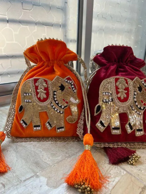 Royal & traditional Zardosi elephant potli