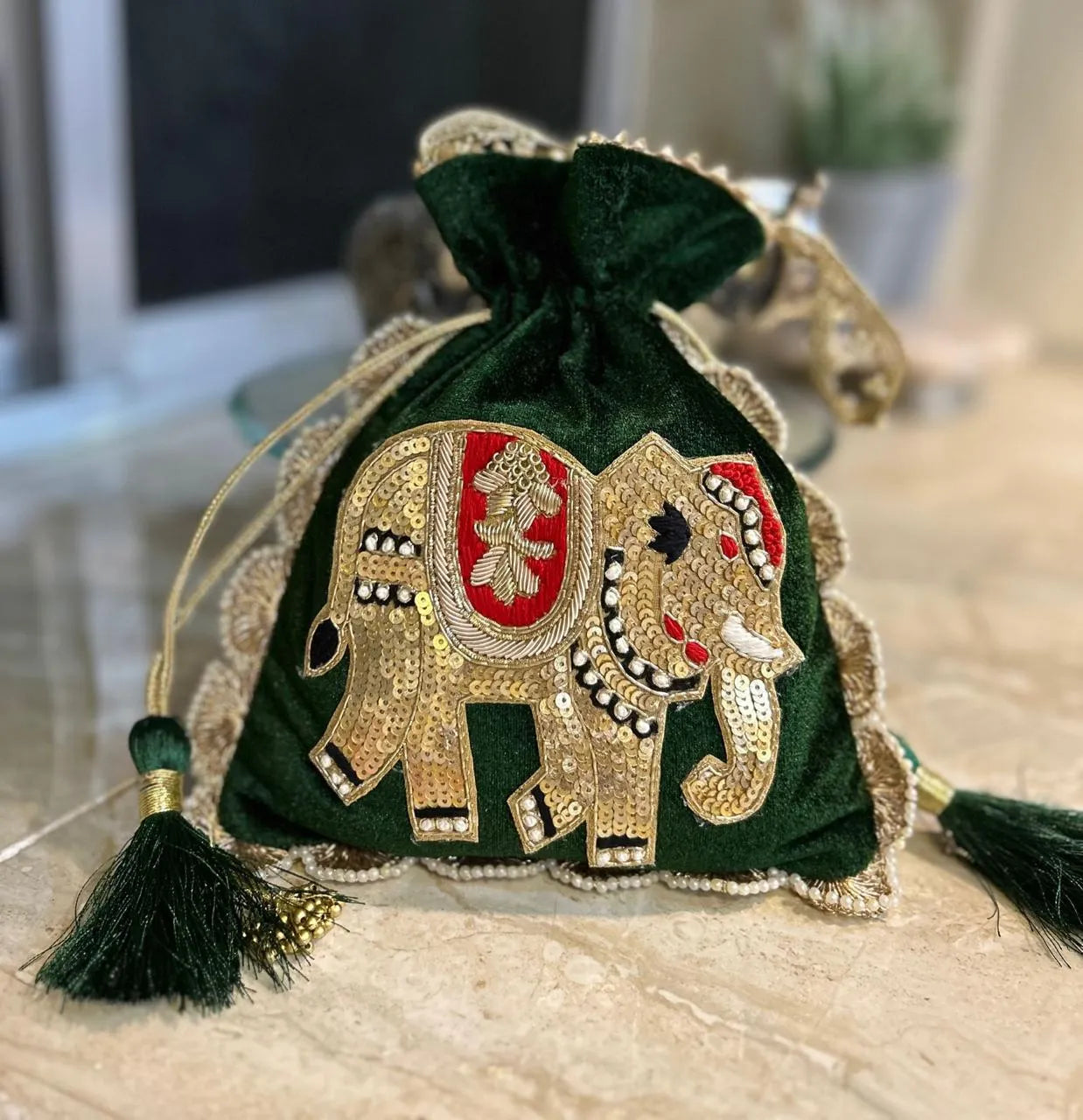 Royal & traditional Zardosi elephant potli