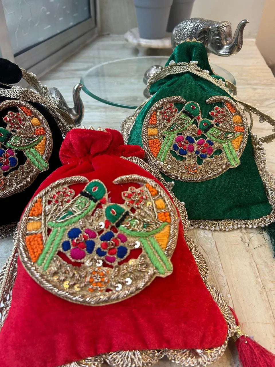 Regal & traditional zardosi parrot potli