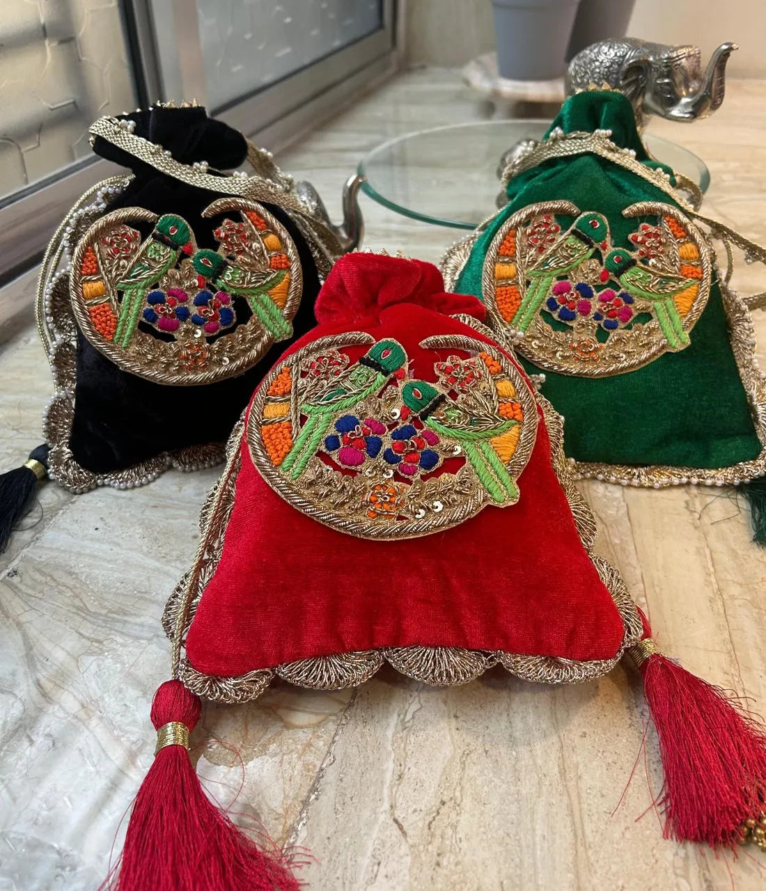 Regal & traditional zardosi parrot potli