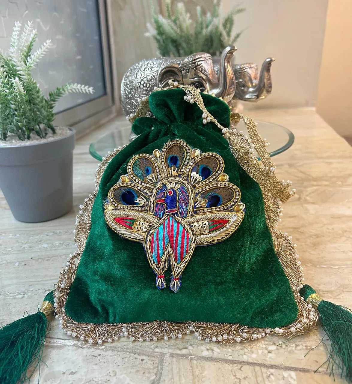 Signature zardosi peacock potli