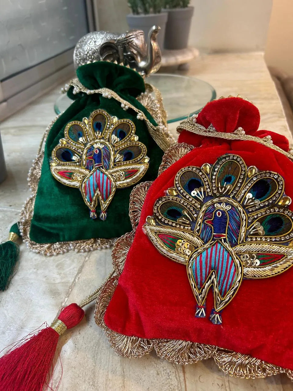 Signature zardosi peacock potli