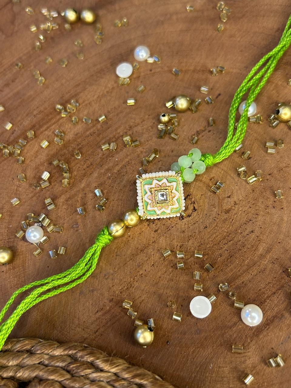 Kundan flower Rakhi in green