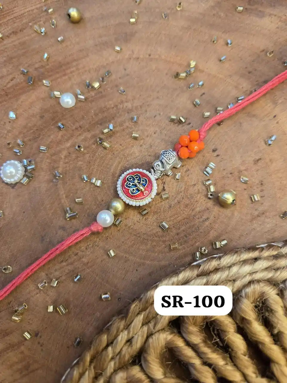 Regal Peacock with Royal Elephant Rakhi