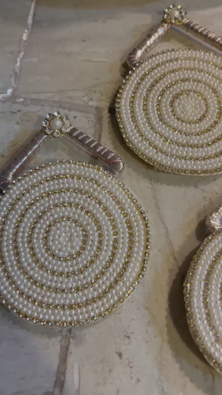 Intricate luxe pearl coin pouch